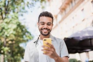 Smiling man on cellphone