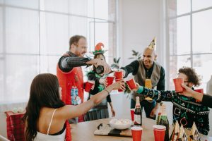 gen z employees working and drinking