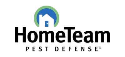 The image shows the logo for HomeTeam Pest Defense, featuring a house silhouette inside a blue and green circle on a black background.